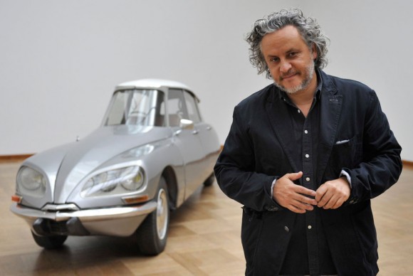 Mexican artist Gabriel Orozco poses in front of his artwork La DS 580x388 Gabriel Orozco Presents an Expanded Version of His Show at Centre Pompidou