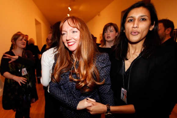 Glasgow born artist Susan Philipsz C is escorted towards her work after hearing the announcement that she has won the Turner Prize 2010 580x388 Glasgow Born Sound Artist Susan Philipsz Wins 2010 Turner Prize