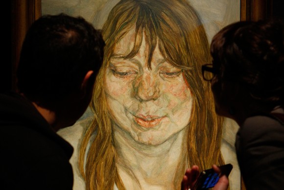 Visitors look at Lucian Freuds work titled Woman Smiling at Christies in London 580x388 Christies to Sell Most Outstanding Group of Lucian Freud Drawings to Come to Auction