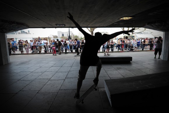 In a file picture taken on May 6 2013 a skateboarder performs tricks in a skateboarding area beneath the Southbank Centre in London 580x388 Skateboarders force London arts centre to halt demolition plans