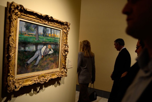 People walks past Boy Resting by French artist Paul Cezanne during the presentation to the press of the exhibition 580x388 First retrospective on Paul Cézanne to be held in Spain in thirty years opens in Madrid