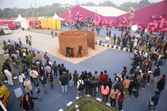 Visitors at India Art fair 2014 watching performance by Anindita Dutta Supported by Latitude 28 580x388  96% of exhibitors report strong sales at 6th edition of India Art Fair